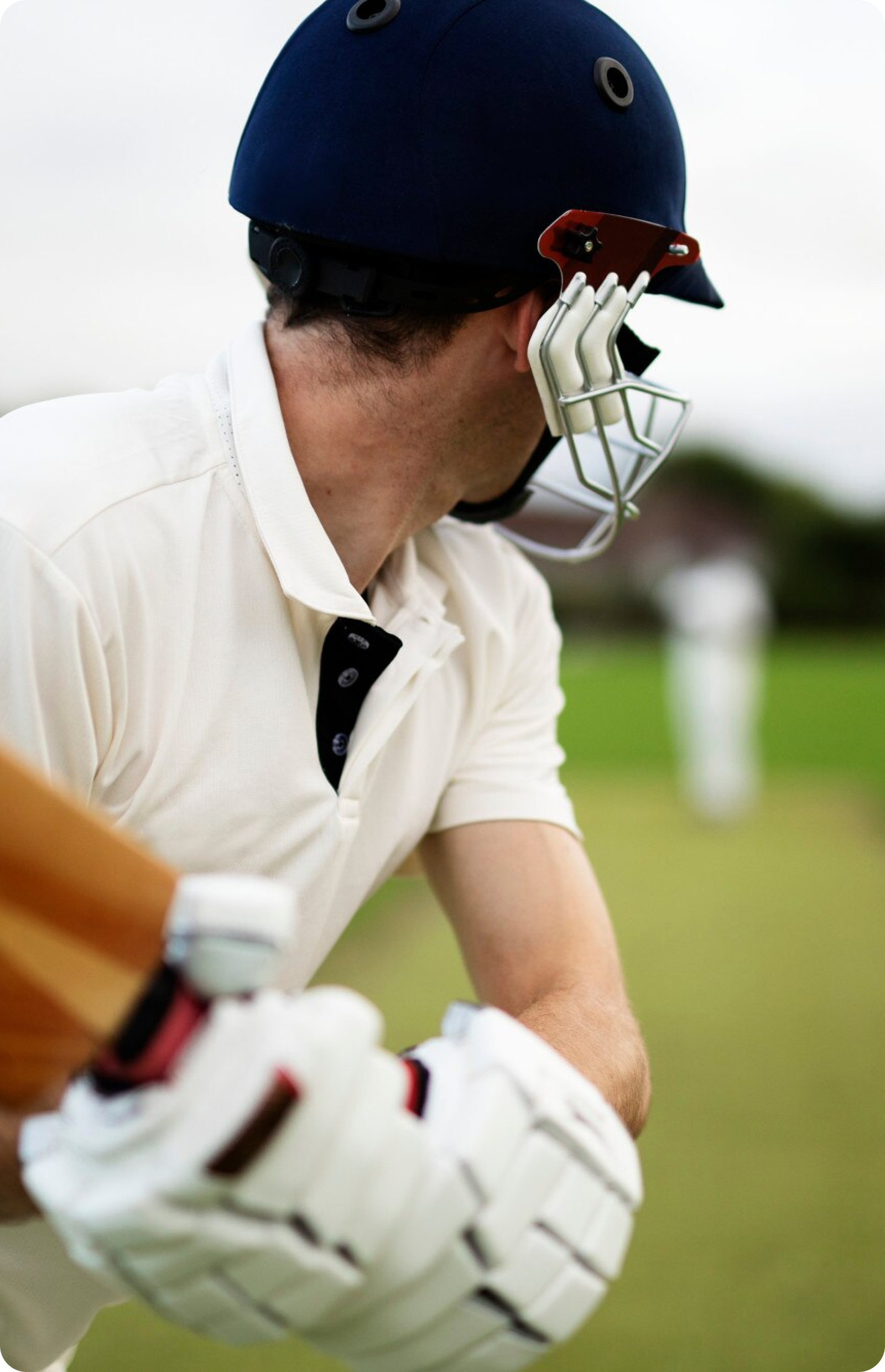 Cricket Finders man wearing a helmet and a helmet